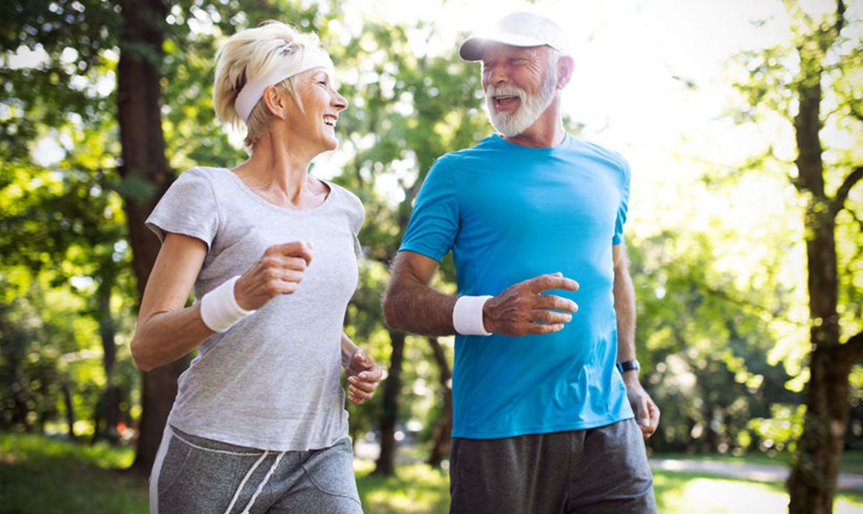 Couple out running being active